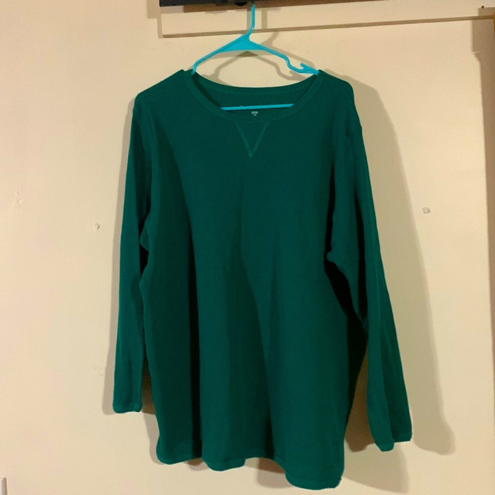 Long sleeve pretty green thermal top. Small stain in front.